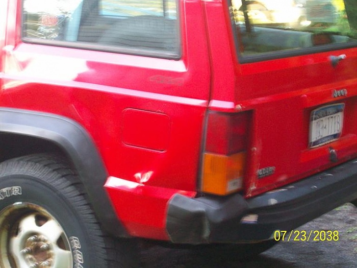 My jeep, teenage female highschool driver.  FIXES?-rear-quarter.jpg