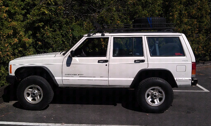 how much lift do u have and what size tires with it?-forumrunner_20111003_224541.jpg